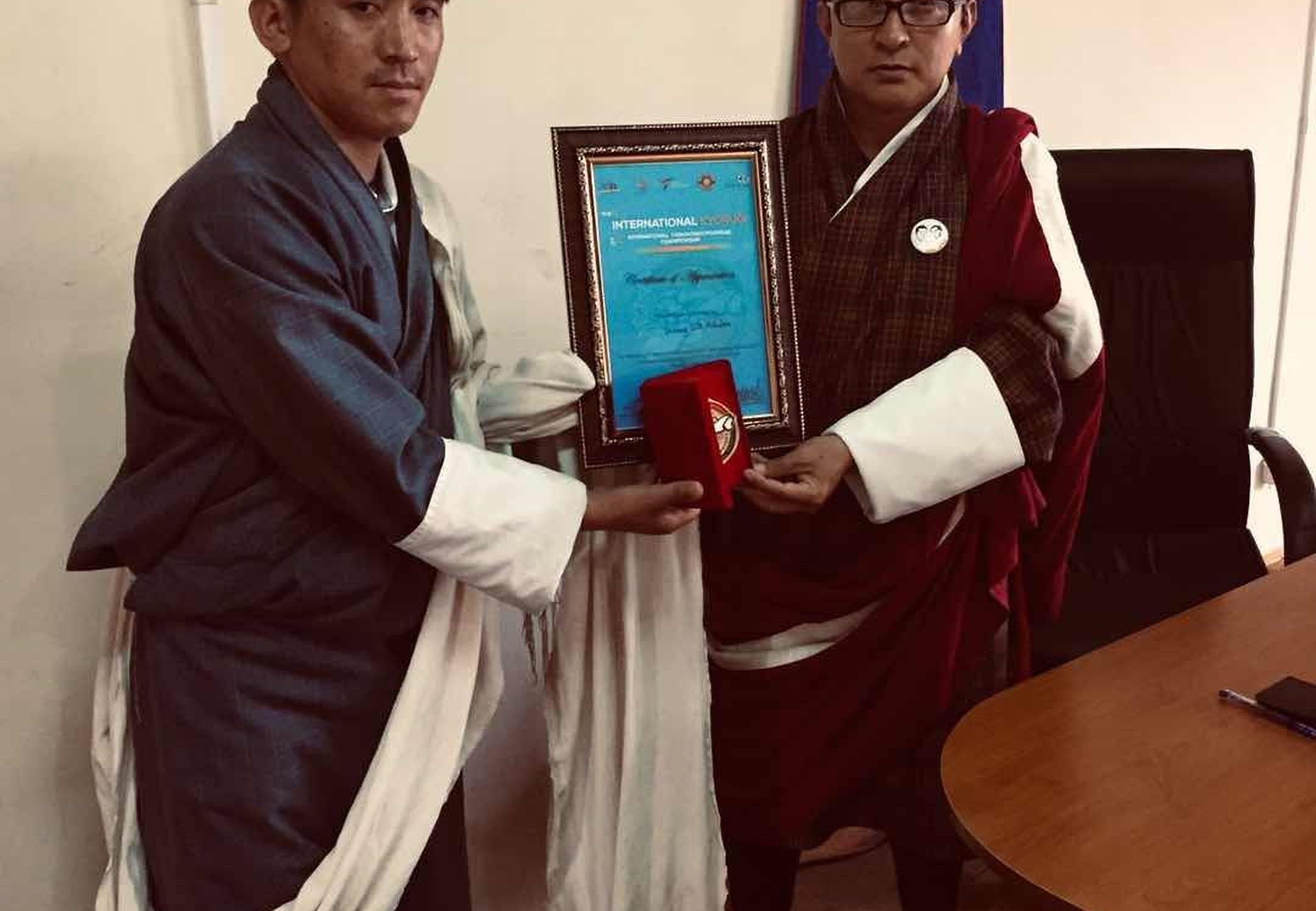 Taekwondo master with Hon'ble Dasho Dzongdag